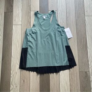 Athleta Swing Forward Pleated Tank in Deep Ocean Teal and black.